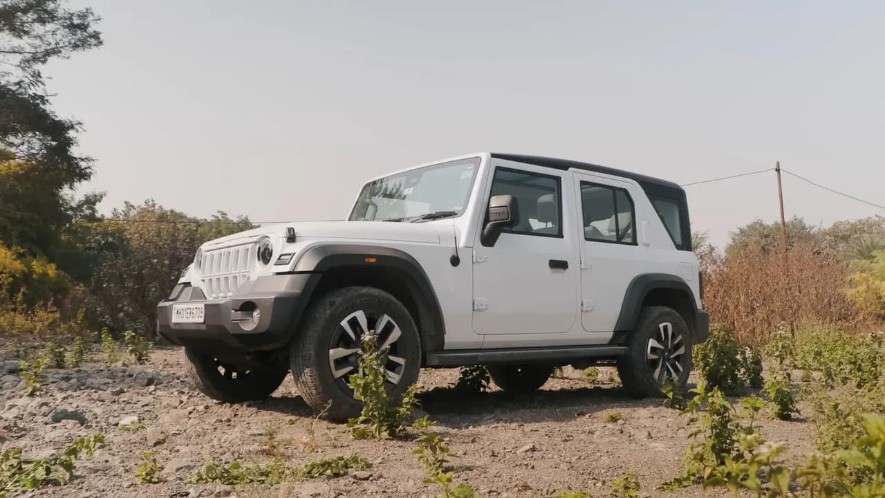 White Mahindra Thar ROXX on a rocky trail